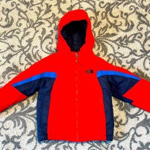 Toddler North Face Winter Coat in excellent condition. Red, navy and royal blue.